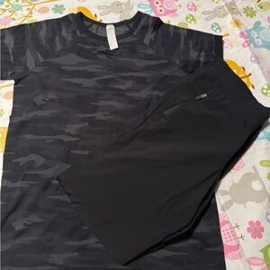 Girls , Black Short Sleeve Camouflage Tee, thin black sweats both Athleta.